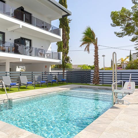 Swim laps in the communal swimming pool