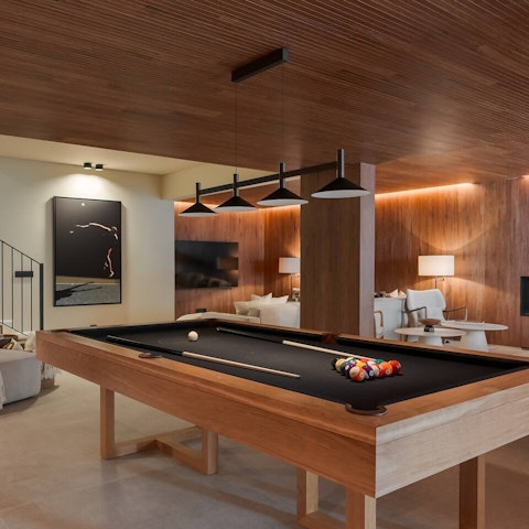 Unwind with friends in the chic games room