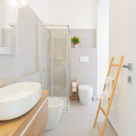 Preen and pamper yourself in the stylish bathroom