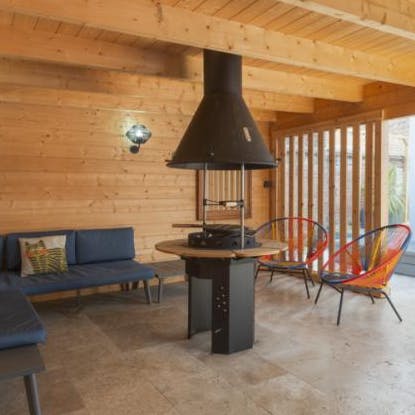 Cosy up by the fire on cooler evenings, a glass of wine in hand