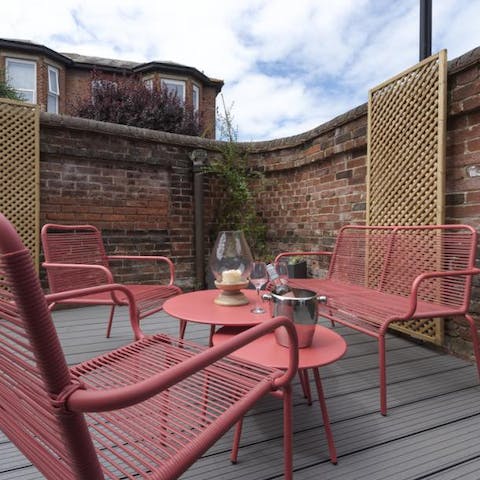 Enjoy a morning coffee on your private patio