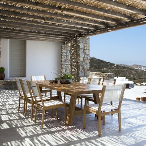 Organise alfresco dinners underneath the straw canopy