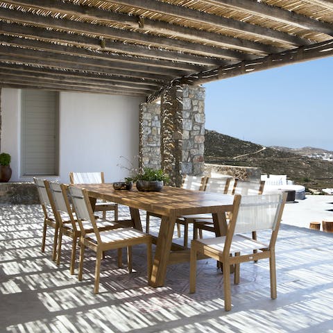 Organise alfresco dinners underneath the straw canopy