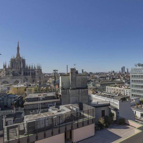 See the city skyline from the shared rooftop terrace