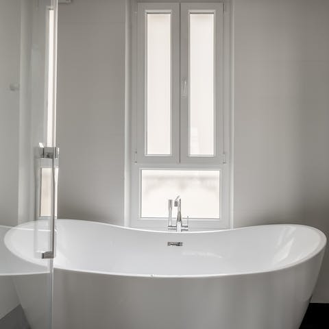 Treat yourself to an indulgent bubble bath in the freestanding tub