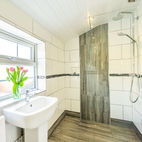 Freshen up in your sleek wet room with its refreshing rainfall shower