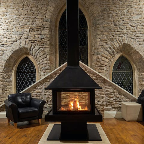 Light a fire in the wood-burning stove to keep the chill at bay