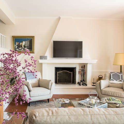 Enjoy a wonderful sense of relaxation from a cosy seat by the indoor fire