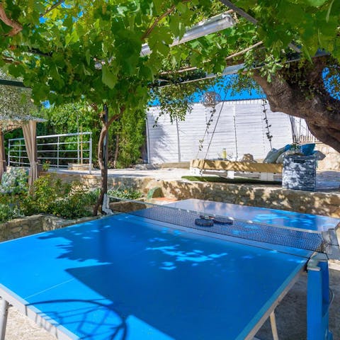 Keep the kids happy with a few games of ping pong in the garden