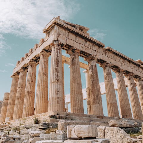 Stay in the heart of Athens, steps away from the city's fascinating historical sights, including the Acropolis