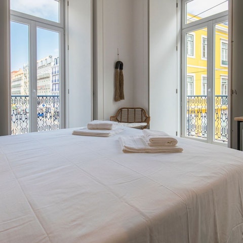 Sip you morning coffee in bed as the city springs to life