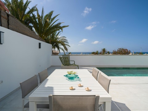 Dine alfresco with a glimpse of the Atlantic