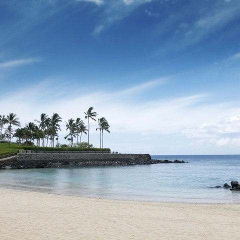 Sun yourself on Pauoa Bay Beach, a short walk away