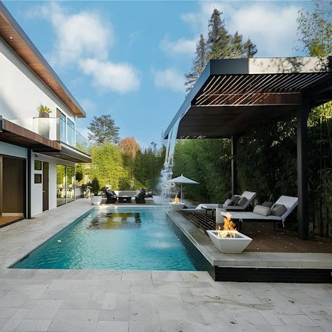 Soak up the Los Angeles sun in the resort-style garden with its pool and waterfall