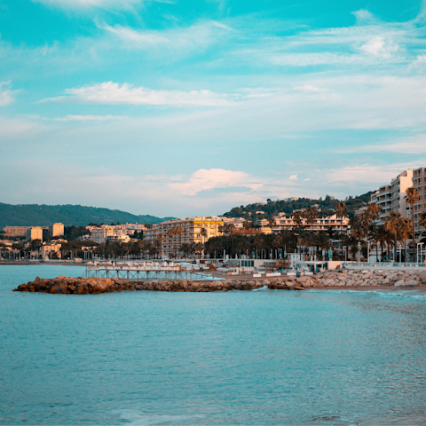 Watch the sun rise as you stroll on the Croisette