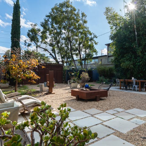 Light the fire pit in the large garden when the Californian weather turns cooler