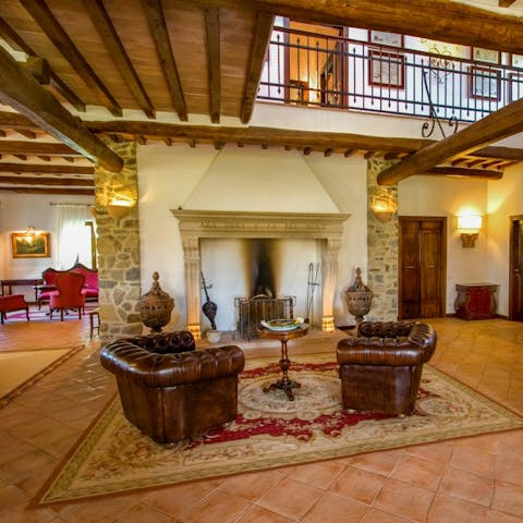 Enjoy pre-dinner cocktails in front of the fireplace