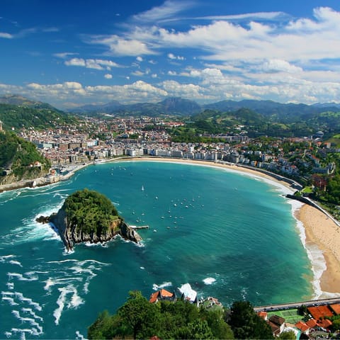 Dip your toes in the ocean at La Concha beach, just a few metres from the front door