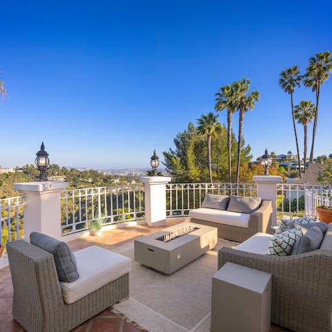 Retreat to the balcony to admire the incredible vistas beyond as the fire pit warms your toes