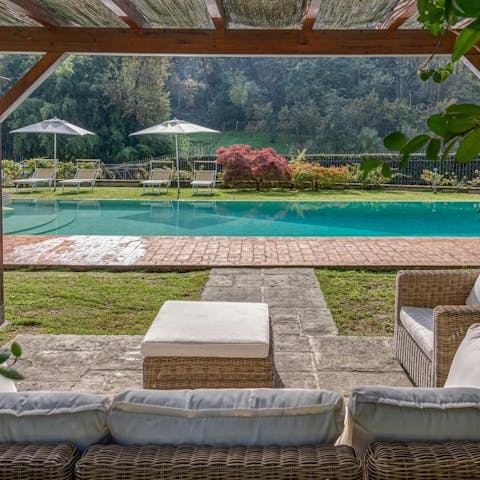 Swim laps of the pool and admire the forest views