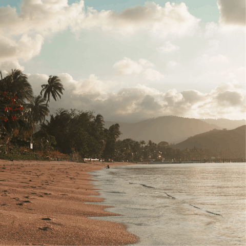 Immerse yourself in the tropical beauty of Koh Samui, with an idyllic beach at your doorstep