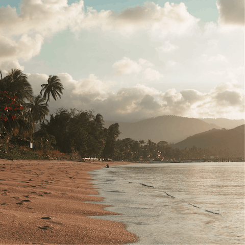 Immerse yourself in the tropical beauty of Koh Samui, with an idyllic beach at your doorstep