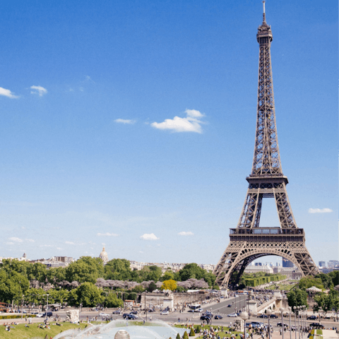 Scale the Eiffel Tower on a sunny afternoon, just 2km away