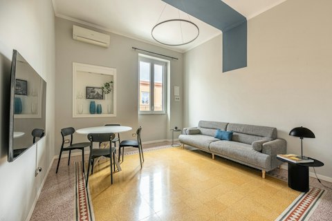 Gather in a space where original terrazzo floors meet contemporary design