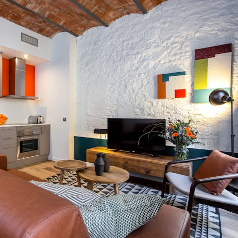 Cosy up in the stylish living space with traditional Catalan touches