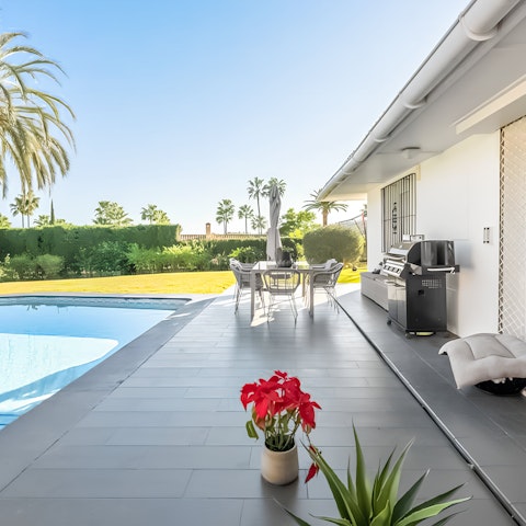 Light the barbecue for an alfresco meal on the terrace