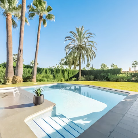 Swim in the private pool as the sun warms your skin