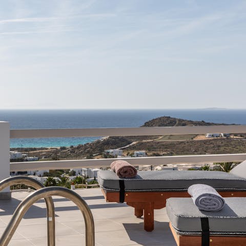 Recline on a lounger and lap up the seascape