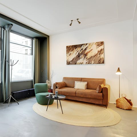 Make yourself at home in the bright living area, a glass of wine in hand