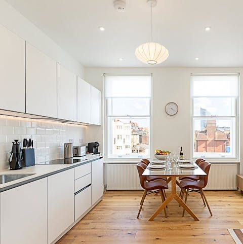 Gather in the light-filled dining area for a cosy meal