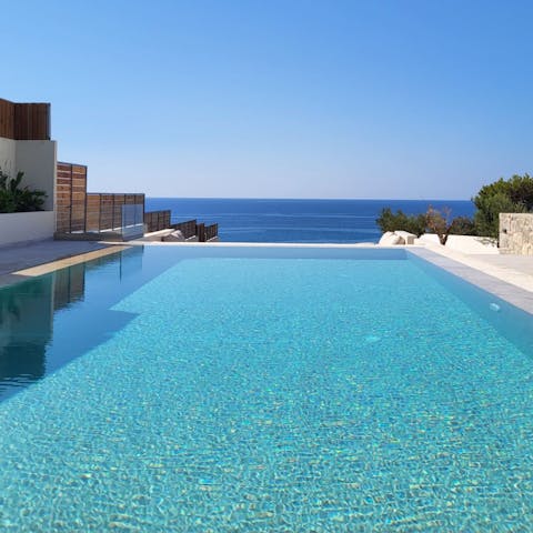 Go for a dip in the private pool and admire the sea view