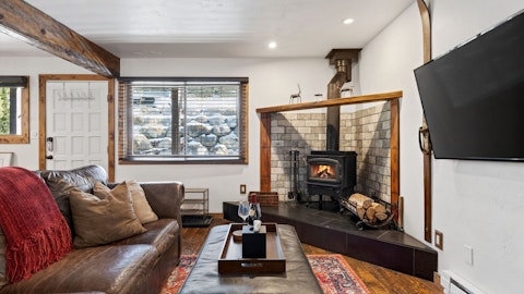 Warm up beside a wood-burning stove after a day on the slopes