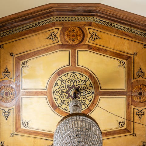 Drink in the old-world charm of this fresco-filled home