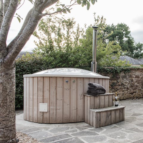 Soak in the wood-fired hot tub