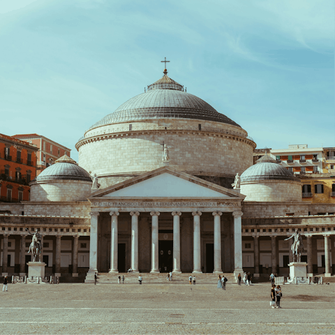 Stroll over to the Basilica of San Francesco di Paola and take in its neoclassical beauty on your way through Piazza del Plebiscito
