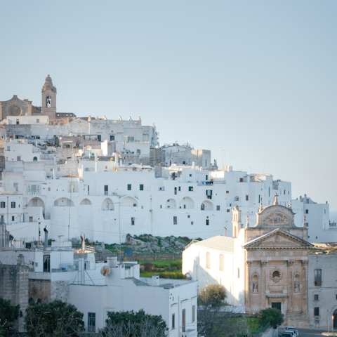 Discover the white-washed city of Ostuni, twenty-five minutes away by car