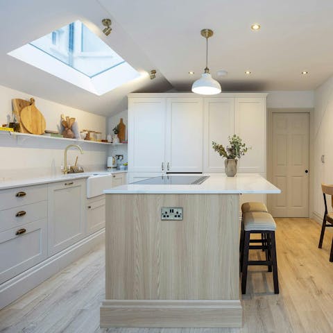 Whip up pancakes for breakfast in the sleek kitchen