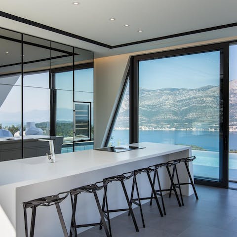 Perch at the sleek breakfast bar with your morning coffee