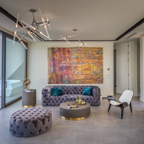 Take a moment to relax in the stylish living space