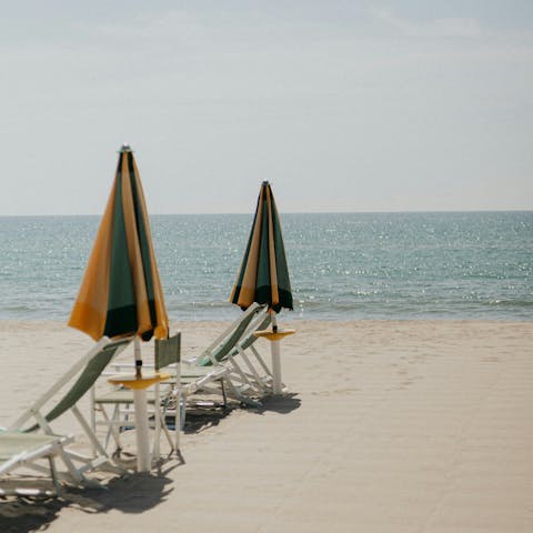 Spend blissful days relaxing on the beach in Viareggio