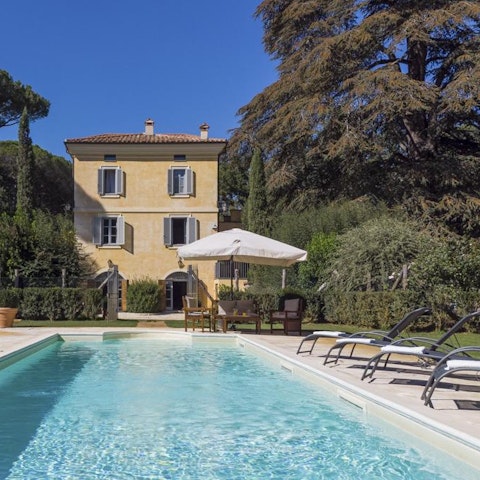Soak up the sun by the pool, interrupting your tanning time for meals and cooling dips in the water