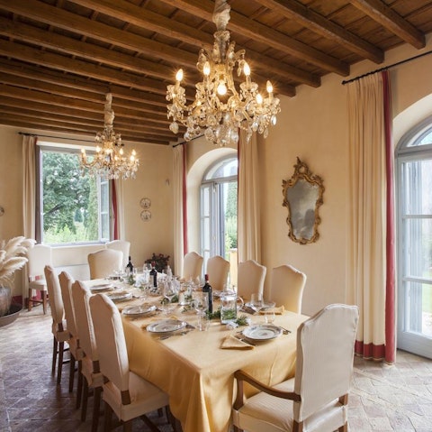 Sit down for sociable suppers beneath the ornate chandeliers