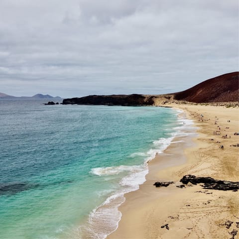 Wander down to Playa Blanca and sprawl out on the sand – it's a twenty-three-minute stroll away