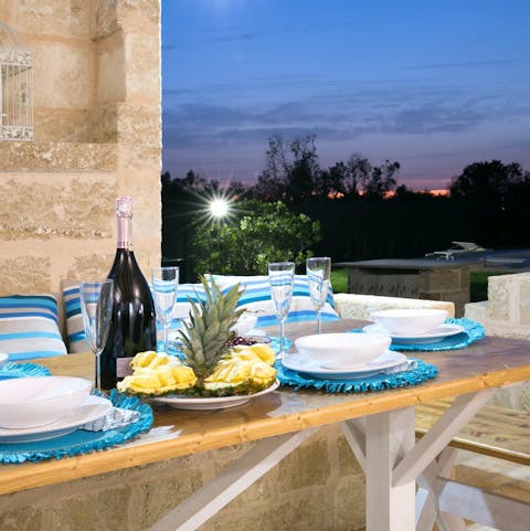Share some local dishes and a bottle of fizz alfresco in the garden