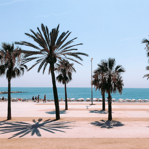 Pack a picnic and hop on the metro to reach Barceloneta Beach in thirty minutes