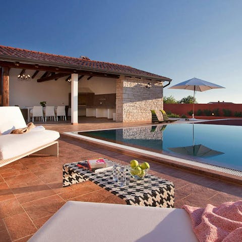 Lounge by the pool and soak up the sun
